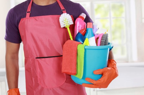 Cleaner using protective equipment while handling cleaning products