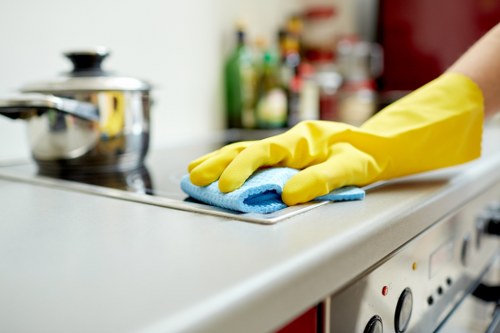 Supervisor reviewing workplace safety measures with cleaning staff
